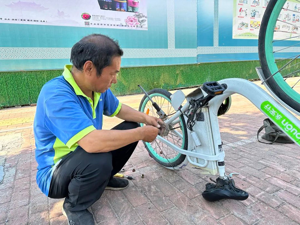 每天檢修200余輛故障車確保市民騎行安全